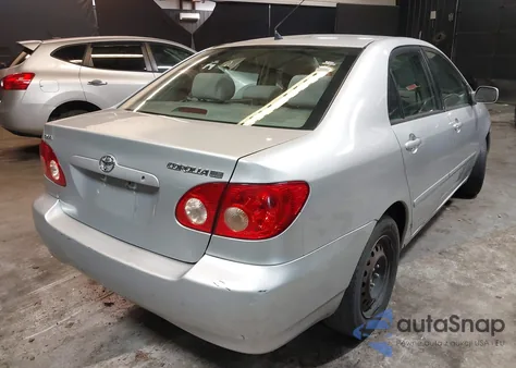 2005 Toyota Corolla Le z USA, uszkodzony, nr VIN 2T1BR30E45C423706